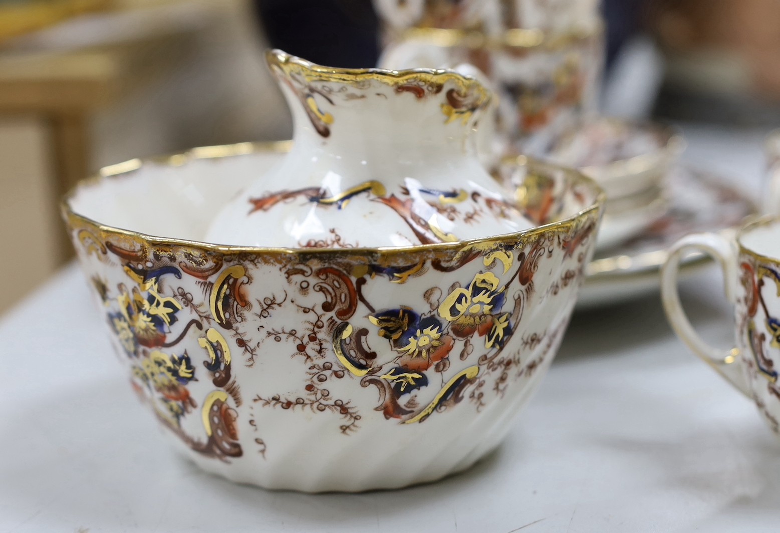A 'Sylvan' pattern tea service, spiral fluted with cobalt blue, rose and gilt decoration (40 pieces)